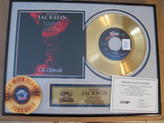 Michael Jackson 24 kt. Gold plated Record Scream: Michael and Janet Jackson duet of Gold record "Scream". Very Rare,Limited edition of only 7000 total in the world. Be a part of history and own Michael Jackson"s Gold record.This gold record is a 