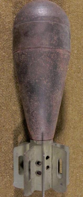 WWII ROCKET GRENADE ARTILLERY: THIS IS A WWII ROCKET GRENADE ARTILLERY BRING BACK. IT IS 7 1/2" TALL AND HAS A FINNED BOTTOM. * * *