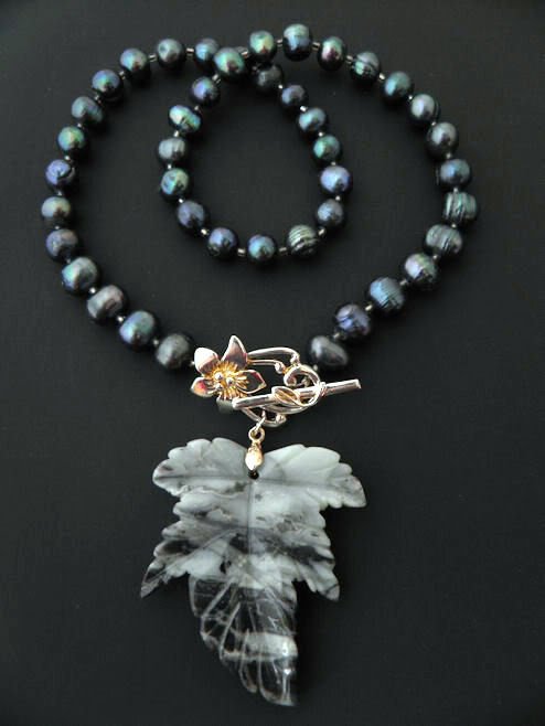 Hand Carved-Natural Amazonite Leaf Necklace: One of Kind Hand Carved-Natural Amazonite gemstone Leaf pendant necklace, Necklace measures approximately 17.5in.