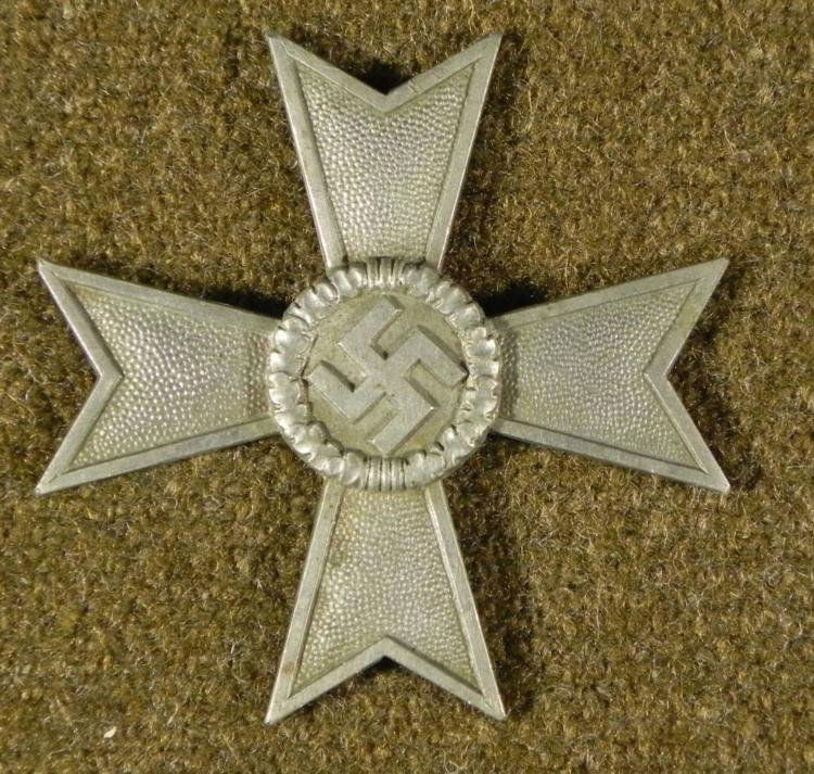 NAZI WAR MERIT CROSS-SILVER-1ST CLASS- UN-FINISHED ORIG: NAZI WAR MERIT CROSS-SILVER-1ST CLASS-ORIGINAL-UN-FINISHED-TAKEN FROMFACTORYINTERESTING PIECE-GUARANTEED ORIG-WAR MERIT CROSS WITHSWASTIKA ON MALTESE CROSS-MARKED WHERE LATCH WAS TO BE PLACED-TAKEN BY