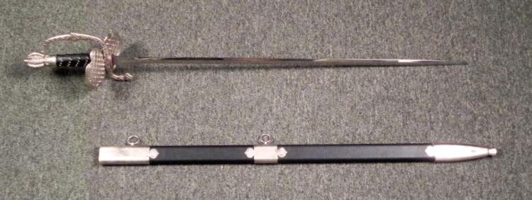 VINTAGE GERMAN RAPIER SWORD W/SCABBARD: VINTAGE GERMAN RAPIER SWORD W/SCABBARD-40" O/A-DETAILED HEAVY METAL HILT LARGE ROUND SPLIT SEGMENT POMMEL--DOUBLE PIERCED METAL UP-AND-"DOWN HANDGUARD--WRAPPED GRIP WITH FIRM GRIP NUBS--WRAP AROUND ""