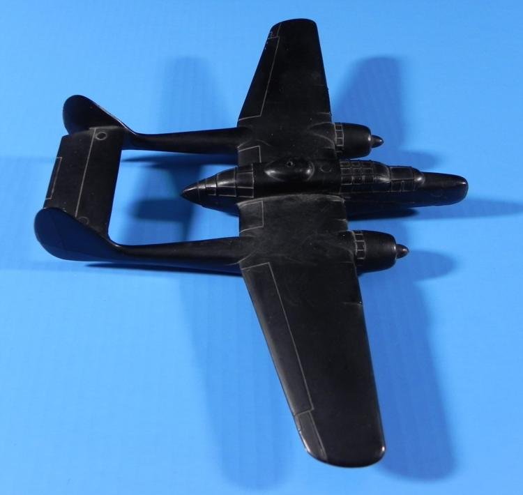 WWII Spotter Plane Silhouette Model Original USA P-61: This airplane is a "spotter," made to teach and aid in aircraft identification during WW II. It measures 8 1/2" in length, with a 11" wingspan. It is all plastic in matte black. The model of the plane
