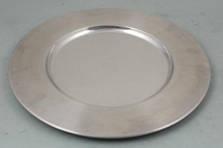 Mid Century Danish Modern 16 Inch Serving Plate: This modern serving plate is from a Danish maker from the mid century period. The sticker on back is marked Made in Denmark. The surface has some scratches and scuffs, and could be buffed out. Once yo