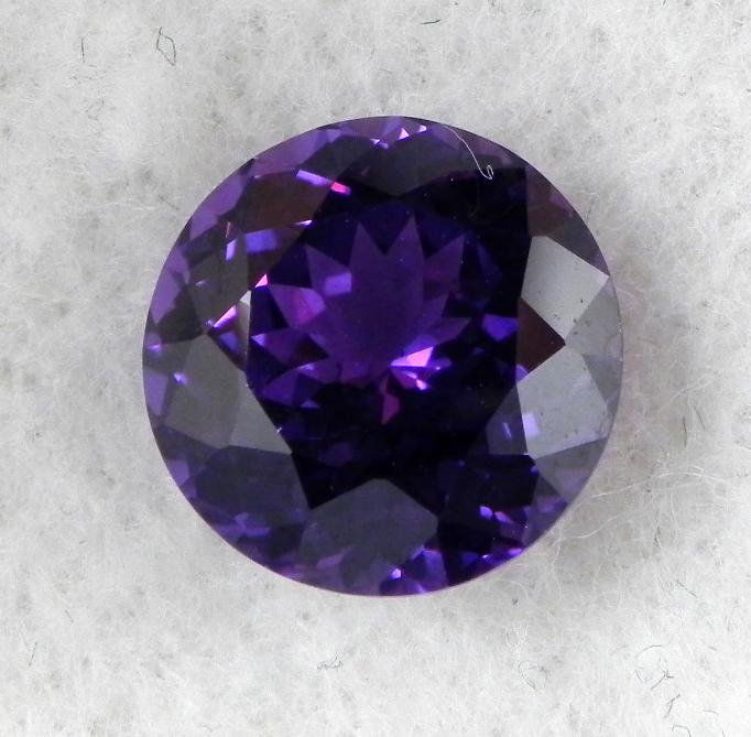 9.73ct Lab Created Alexandrite Gemstone Green-Blue: Gemstone: Lab Created Alexandrite * Style: Round ShapedColor: Green-Blue to Pink * Carat weight: 9.73 * Condition: Very high quality, with excellent cutting, clarity, and luster