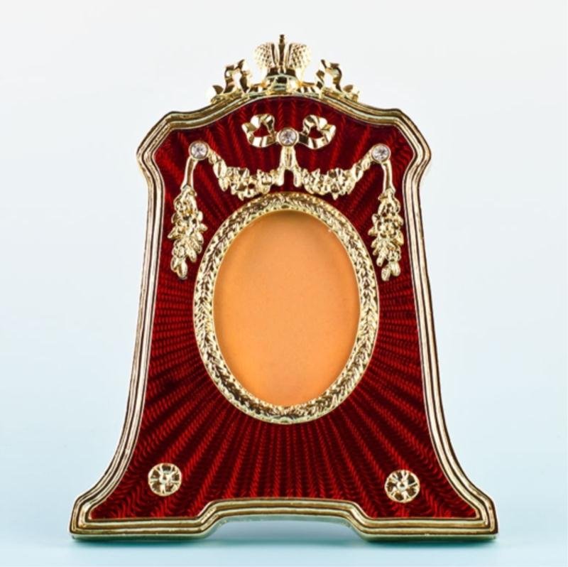 Red Guilloche Enamel Faberge Frame: Red Guilloche Enamel Faberge Inspired Frame Dimensions: 4.5'' (H) x 3.75'' (L) Photo Opening Dimensions: 1.75" (H) 1.25" (W) Pewter, Enamel, Crystals