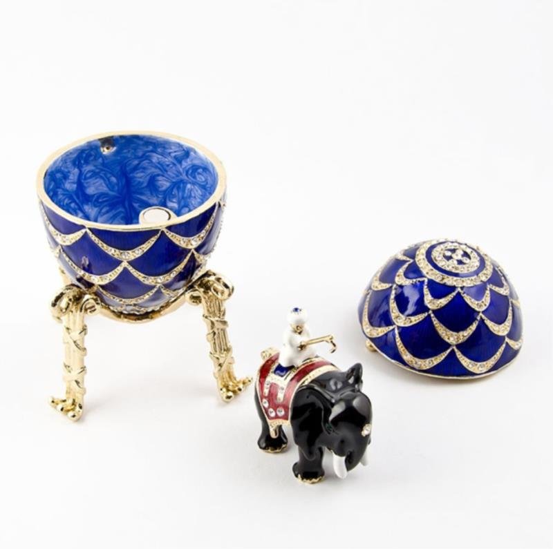 Pine Cone Faberge Inspired Egg: The Pine Cone egg is a jewelled enameled Easter egg made under the supervision of the Russian jeweler Peter Carl Faberge by workmaster Mikhail Perkhin in 1900.The egg was made for Alexander Kelch,