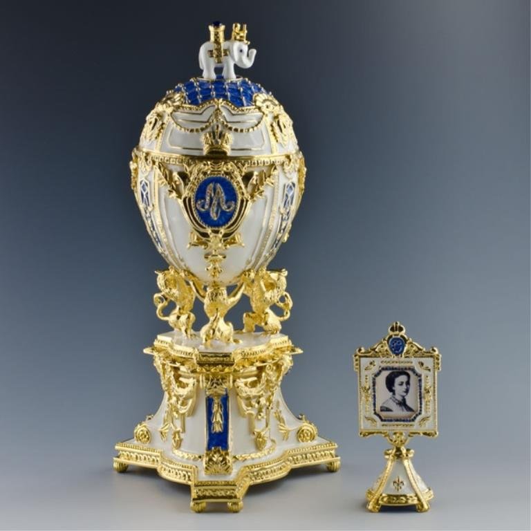 Royal Danish Faberge Inspired Egg: 9.5'' (H) X 3.25'' (W) 3 lbs 12 oz Picture Frame Included Contains Music Box and Plays "For Elise" by Ludwig van Beethoven Pewter, Enamel, Crystals Russian Imperial Royal Danish Jubilee Egg is