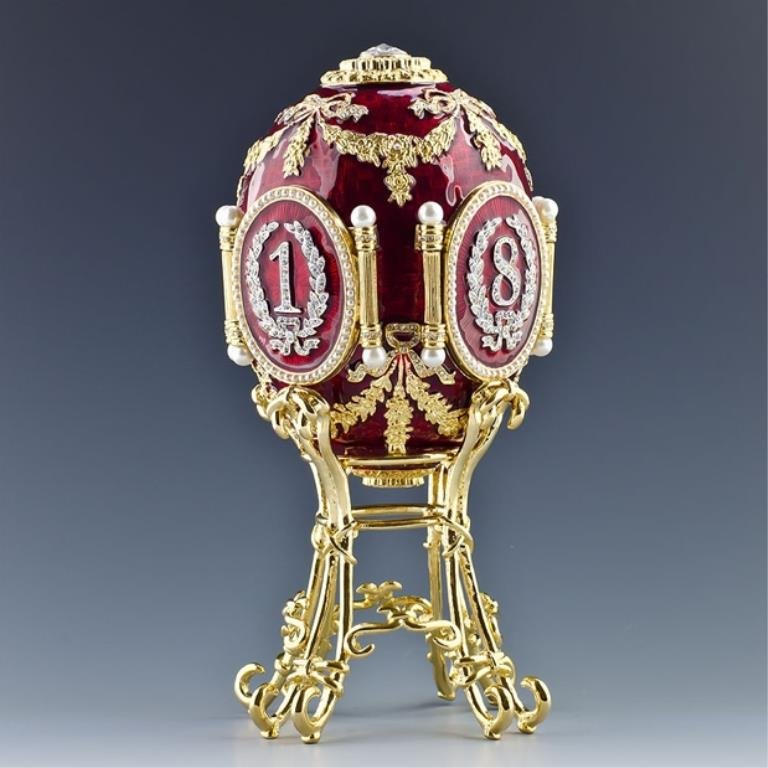 Caucasus Faberge Inspired Egg: Egg + Stand Dimensions: 6.5 '' (H) Egg Dimensions: 4" (H) x 2.75" (D) Material: Pewter, Crystals, Enamel The first of Imperial Easter eggs known to be dated. Made by M. Perchin under the Faber