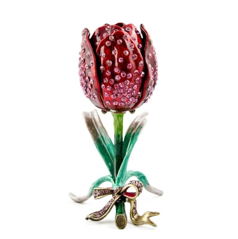 Faberge Blooming Rose Jewelry Box: The rose leaves are covered all over with miniature pink crystals giving it a shiny spark. Two of the leaves open up to provide a jewelry space. Graceful and stylish, this jewelry box is amazing d