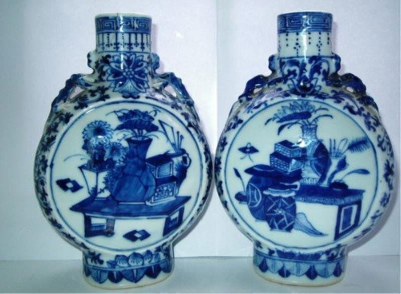 PAIR Antique Chinese porcelain Blue & White Vases: PAIR L19thC Antique Chinese porcelain Blue & White Moon flask vase Pair of close matching Chinese under glaze blue hand decorated moonflasks with patterns of precious objects,tables,vases etc.