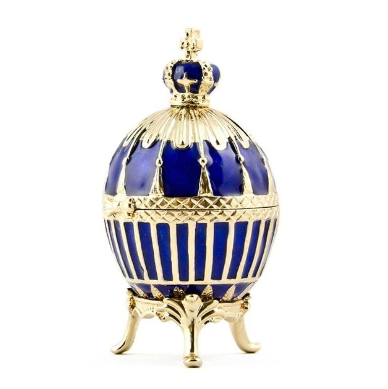 Blue Enamel Ribbed Faberge Inspired Egg: As the name implies, it is of three colors of gold with translucent sapphire blue enamel in a simplified Renaissance style. It is surmounted with an Imperial crown of gold set with sapphires and d