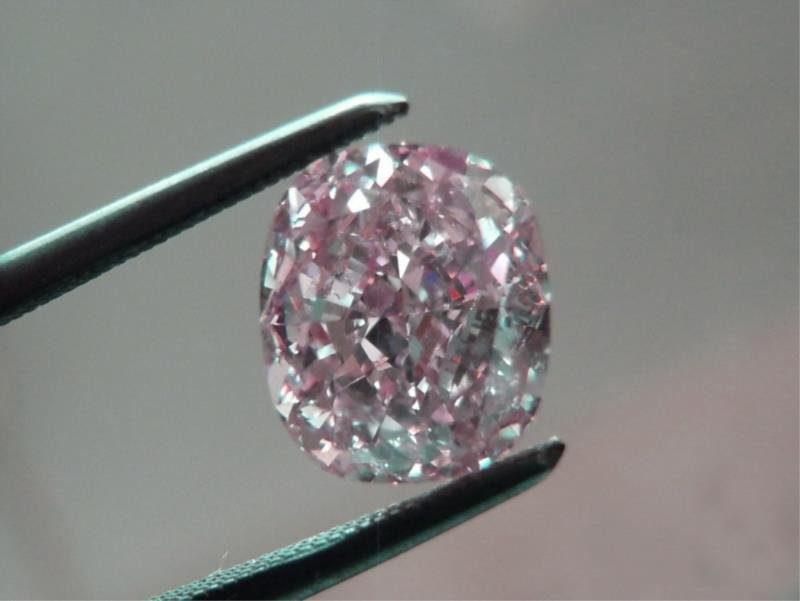 Bianco 1.5 Carat Pink Cushion Cut Diamond: Bianco 1.5 Carat Pink Cushion Cut Diamond. bianco is the mark for high quality crystallographically isometric gems that correlate, in some ways to Moissanite. An extremely rare gem, discovered