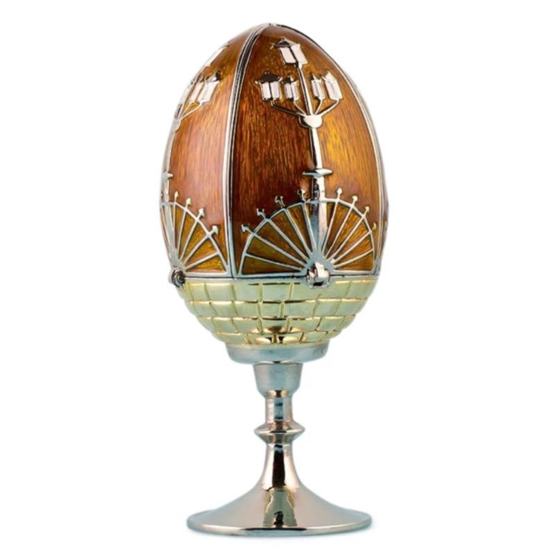Monument Faberge Inspired Egg: Two contrasting colors make the egg an absolute eye catcher and the perfect decoration for the dining room, bedroom, or living room! Dimensions: 4'' (H) X 1.75'' (D) Pewter, Enamel
