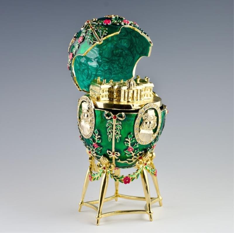 Alexander Palace Faberge Egg: The nephrite egg is adorned with five miniature portraits of the children of Tsar Nicholas II and Alexandra Fedorovna, and contains a replica of the Alexander Palace at Tsarskoe Selo. The oval por