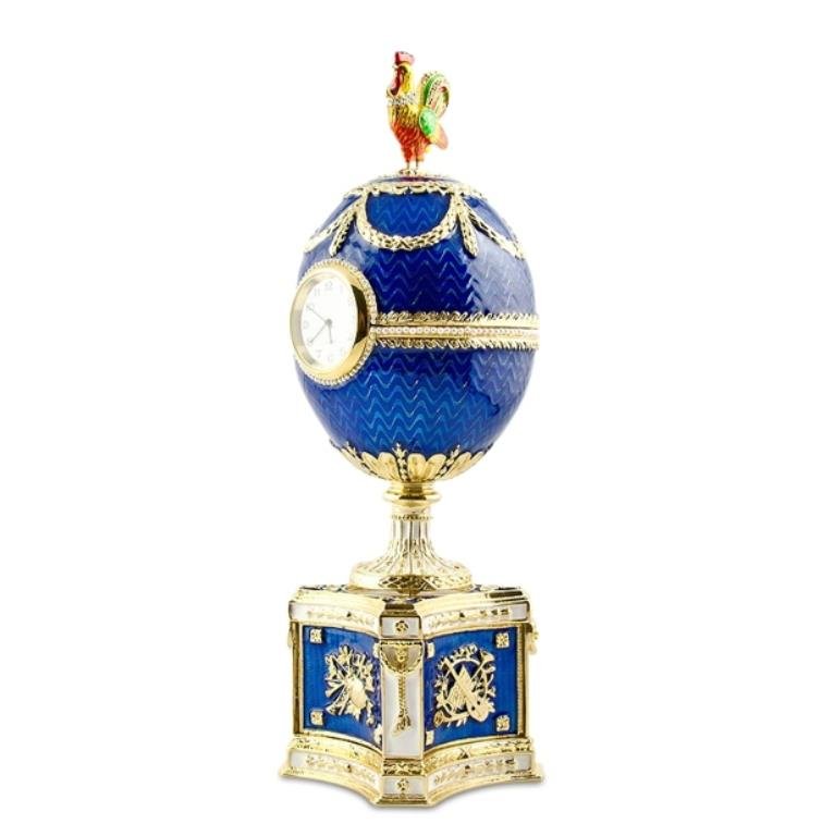 Kelch Chanticleer Faberge Inspired Egg: Contains Music Box (Plays "For Elise" by Ludwig van Beethoven) 9 ''(H) X 3'' (W) 3 lbs Pewter, Enamel, Crystals The Kelch Chanticleer Fabergeegg is a jeweled enameled Easter egg made by Michae