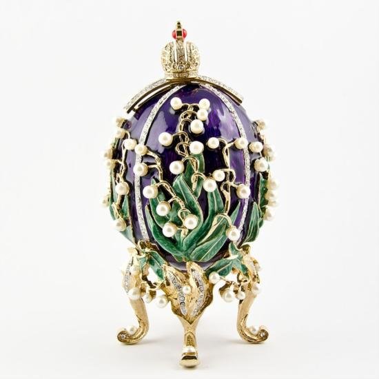 Lilies of the Valley Egg by Carl Faberge: Lilies of the Valley Egg by Carl Faberge. Material: Pewter, Crystals, Enamel. Dimensions: 6.5in (H) x 2.75 (D) The famed Faberge eggs are jeweled eggs, often with the most ornate, minu