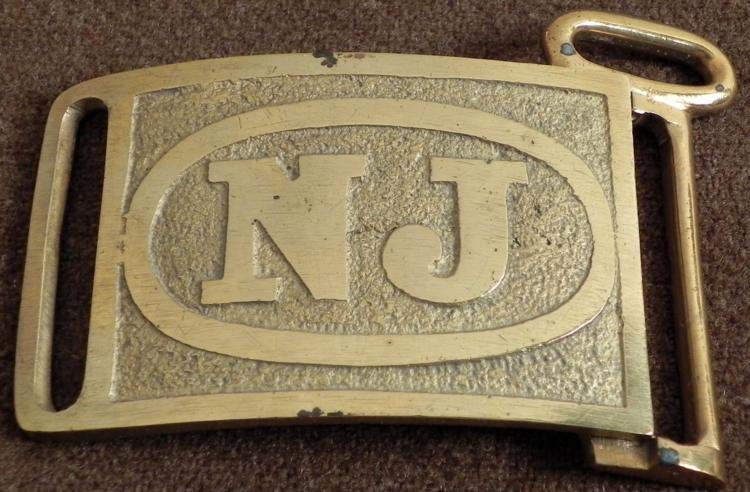 NEW JERSEY MILITIA SPANISH AMERICAN WAR BELT BUCKLE: NEW JERSEY MILITIA SPANISH AMERICAN WAR BELT BUCKLE. THE BRASS BUCKLE HAS "NJ" IN AN OVAL IN THE CENTER. THERE IS A SEPARATE BELT KEEPER WITH CROSS STRAP KEEPER TOP. THIS IS A NICE ANTIQUE BELT 