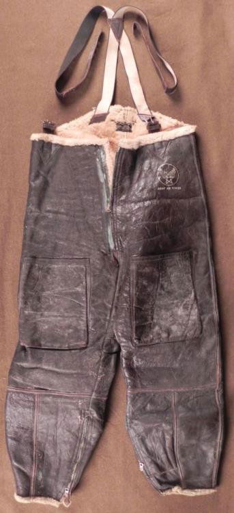 WWII USAAF TYPE B1 LEATHER FLIGHT PANTS-SHEEPSKIN AAF: WWII USAAF TYPE B1 LEATHER FLIGHT PANTS-SHEEPSKIN LINED-AAF LOGO W/SUSPENDERS * SEWN IN SUSPENDERS-LEATHER COLD WEATHER FLIGHT PANTS-ZIPPERS ON LEGS & FLY-AAF LOGO ON TOP OF PANTS AND BY FLY ZIPPE