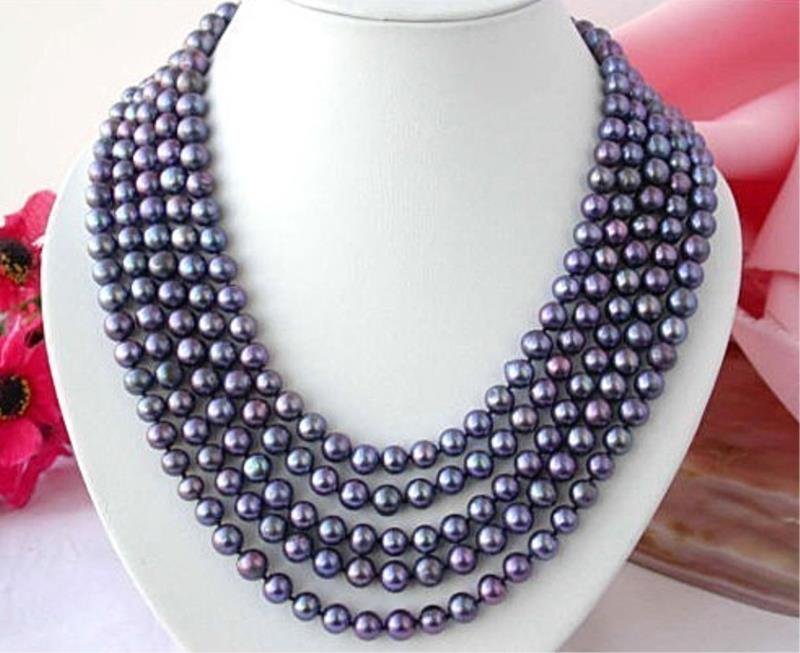 Superior Black Pearl Tahitian Necklace: Superior Black Pearl Tahitian Necklace, measures approx 100 inches, 14kt gold clasp