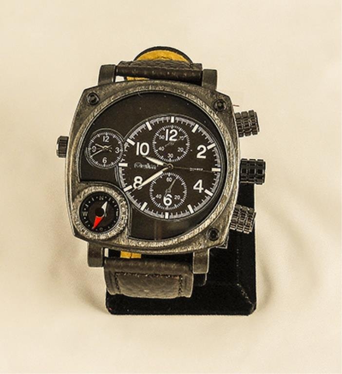 Big Face Men's Dual Time Zone Wrist Watch: Big Face Men's Dual Time Zone Wrist Watch. The Watch Has A Brushed Black Stainless Steel Face With Five Dials: 2 Time Zones, A Compass, And Hour Dial With A Second Hand, And 2 Additional D