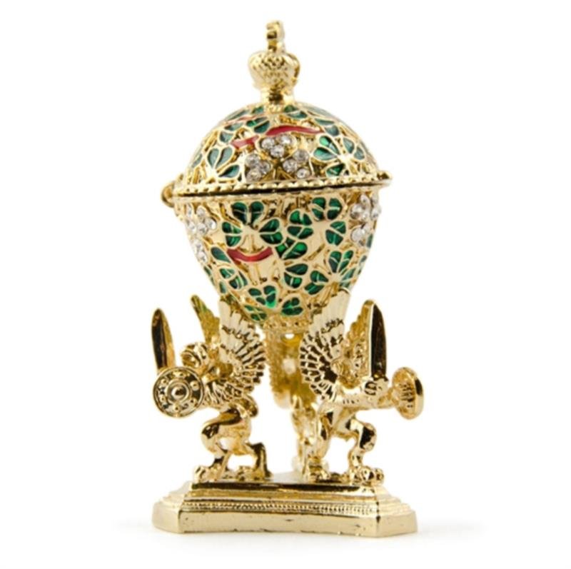 Three Griffins Faberge Inspired Miniature Egg: 2.25" (H) x 1" (D) Pewter, Enamel, Crystals Faberge is a trademark of Pallinghurst Resources LLP. This piece of art should not be associated with Pallinghurst Resources LLP, Faberge Limite