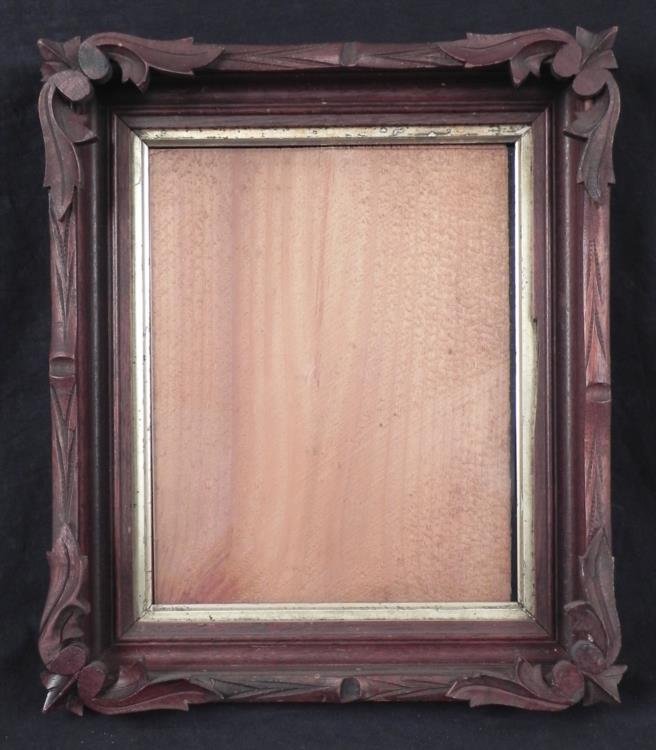 Victorian Antique Walnut Signed Picture Frame H P Moore: This is a walnut hand carved picture frame from the Victorian period, made for 8 x 10 images. It features a nice leaf and fleur de lis pattern at the corners. The inner border is gold painted. There i