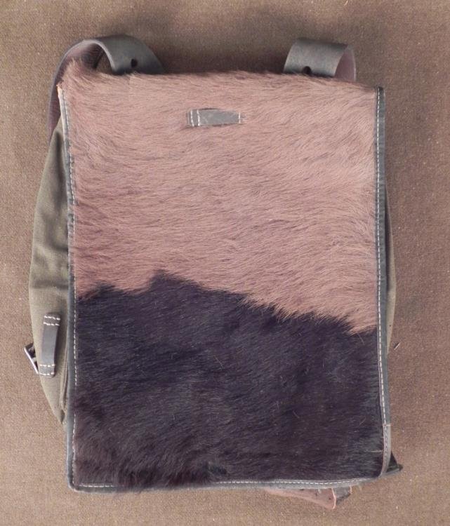 NAZI ORIG HORSE FUR FULL BACKPACK-RB MARKED, W/STRAPS: NAZI ORIG HORSE FUR FULL BACKPACK-RB MARKED-HAS ALL STRAPS AND CLOSURES * OUTSTANDING HORSE HAIR/FUR COMBAT COLD WEATHER BACKPACK-VET BRINGBACK-NICE LIGHT AND DARK FUR COMBINATION WITH NO LOSS OF FUR-