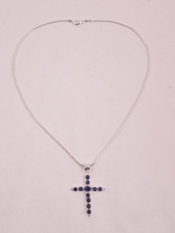 BEAUTIFUL 12.50 CT BLUE SAPPHIRE CROSS PENDANT: BEAUTIFUL 12.50 CT * BLUE SAPPHIRE CROSS PENDANT . MOUNTED IN .925 STERLING SILVER 2" * TALL 1 1/2 " WIDE INCLUDES 20 * " CHAIN 74 CTTW