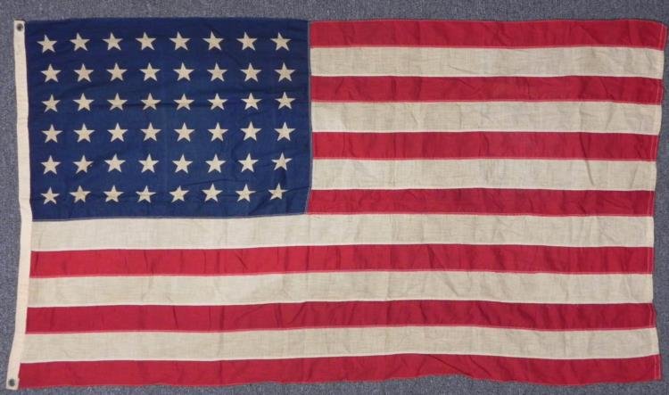 WWII ERA 48 STAR FLAG-3X5'-MULTI-PIECE CONSTRUCTION: WWII ERA 48 STAR FLAG-3X5'-MULTI-PIECE CONSTRUCTION-W/CORNER GROMMETS * * * MULTI-PIECE--COTTON/LINEN MATERIAL