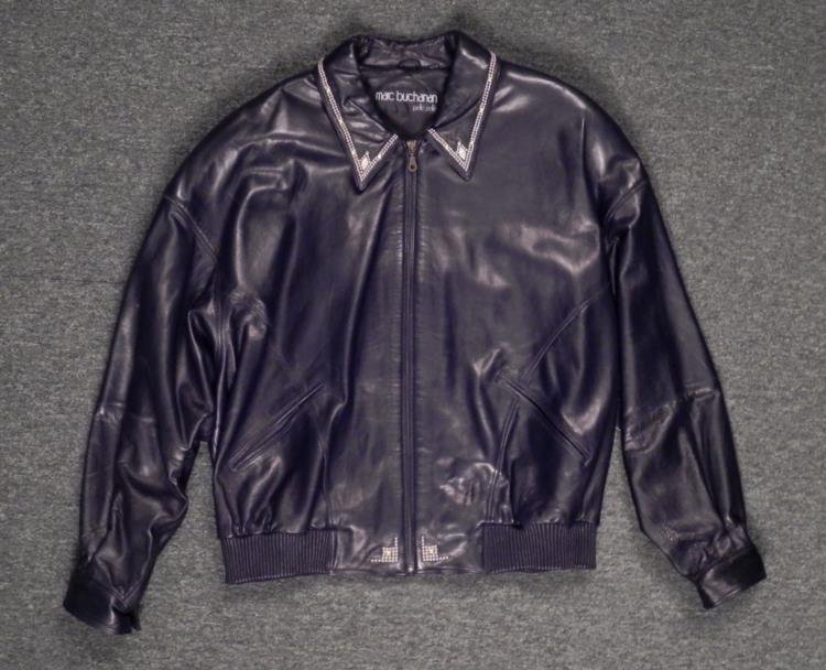 Marc Buchanan Pelle Pelle Black Leather Jacket Studded: This is a classic Marc Buchanan Pelle Pelle men's designer leather jacket. * This style has a biker look, all in black, adorned with studs on back and on the collar. * Condition: ExcellentComposition:
