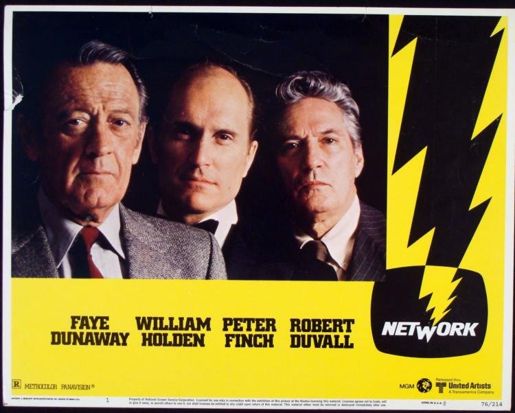 Network Original Movie Lobby Card Robert Duvall 1976: Here is an original lobby card from the 1976 movie "Network." The bold lightning graphic perfectly captures the energy of this great film. Size: 14 x 11 inches Condition: Good; some creasing, and dama
