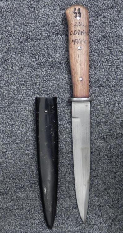 WWII Nazi German Boot Knife,Etched Grip -Tiger Solingen: Here is a WWII era Nazi German Boot Knife with black metal scabbard. It was made by Tiger of Solingen, and has the maker name on the blade. The wooden handle is etched with the letters SS, a name and