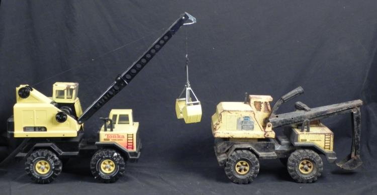 2 Diff Tonka Vintage Turbo Diesel Trucks Crane, Scooper: These are two different designs of crane trucks from Tonka, circa 1970's. Both are steel, with some rubber parts, and plastic wheels and tires. The crane features a folding arm and rotating top. Its l
