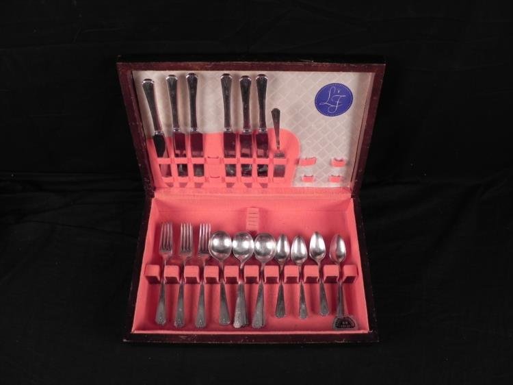 35 Pc Set Community Plate Silverplate Flatware in Chest: This is a 35 piece set of Community Plate Silverplate Flatware. The pattern is Art Deco, and most are engraved with an initial. Overall the pieces are in good previously used condition, and come in a