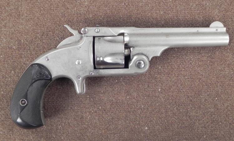 Smith & Wesson Revolver Gun Black Grip Civil War Era: Here is an original Smith & Wesson revolver originally patented in 1865, repatented in 1877. The top of the frame has the maker name, and patent dates, plus REISSUE July 25 1871. The body is nicke