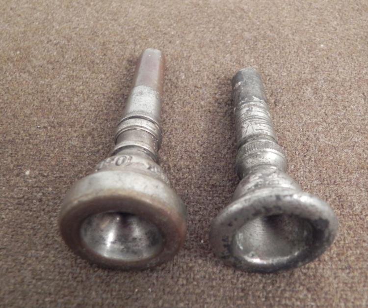 2 TRUMPET MOUTH PIECES-1-VINCENT BACH-NY-10 1/2C: 2 TRUMPET MOUTH PIECES-1-VINCENT BACH-NY-10 1/2C-OTHER UNMARKED UNMARKED PIECE SHOWS MUCH AGE--BACH IN VG CONDITION 