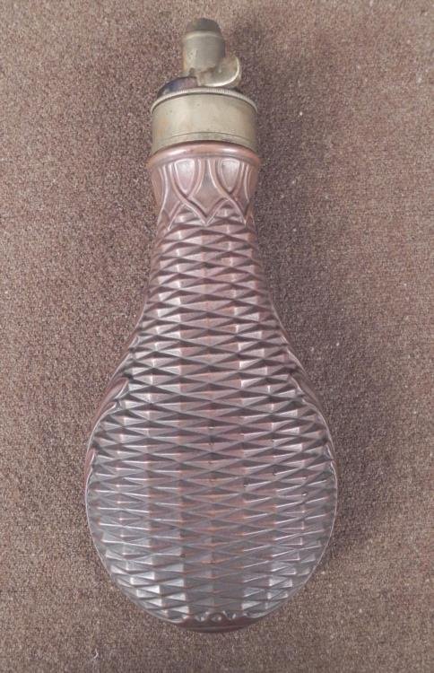Dixon & Sons Antique British Copper Powder Flask 1800s: This is an antique copper powder flask from the British maker James Dixon & Sons. They were one of the major manufacturers of the Industrial Revolution. This powder flash was probably used by a mi