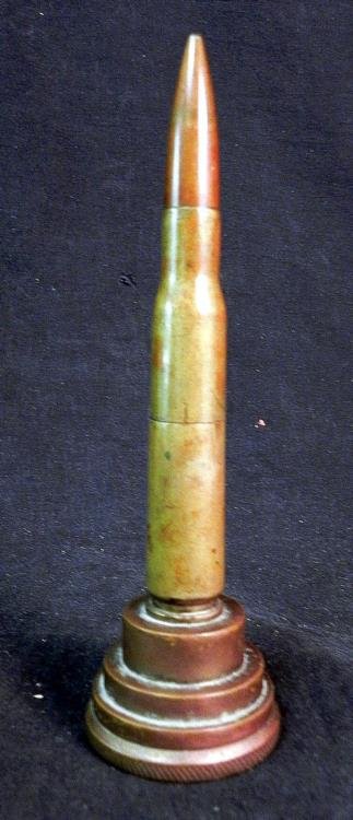 WWII TRENCH ART LARGE BULLET LIGHTER ON STAND-BRASS-6.5: WWII TRENCH ART LARGE BULLET LIGHTER ON STAND-BRASS-6 1/2" TALL---GREAT WWII ORIGINAL BULLET MADE INTO A LIGHTER AND WELL MOUNTED ON A LAYERED BASE-BRASS -