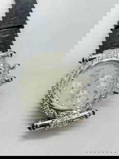 A DIAMOND SET 'IMPERIALE' WRISTWATCH BY CHOPARD 18ct WHITE GOLD: A DIAMOND SET 'IMPERIALE' WRISTWATCH BY CHOPARD 18ct WHITE GOLD   Please note: We have no way of knowing if natural diamonds on the watch were set by Chopard or other so please make your own mind up