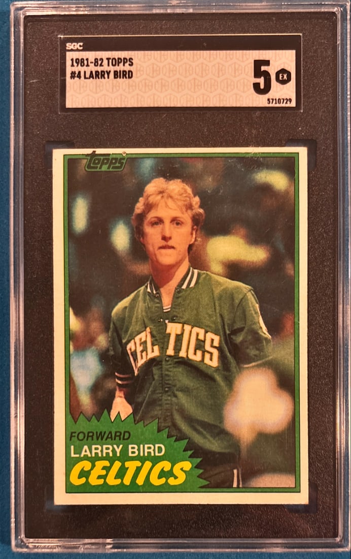 1981-82 Topps Larry Bird #4 - SGC 5 EX - Boston Celtics: 1981-82 Topps Larry Bird #4 - SGC 5 EX - Boston Celtics is a standout collectible that showcases 1981 and represents an important piece of sports history. Cards from this era are prized for their clas