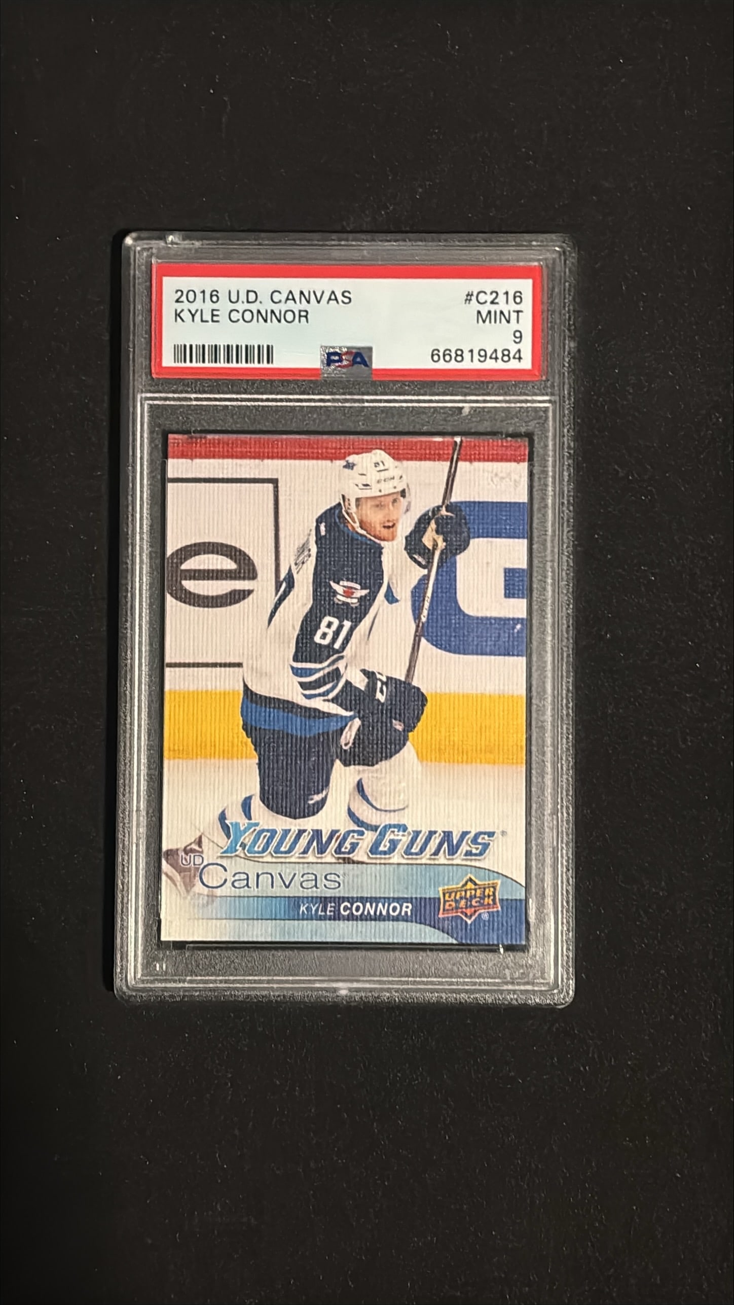 2016 Upper Deck Canvas #C216 Kyle Connor Young Guns PSA 9 MINT: 2016-17 Upper Deck Canvas #C216 Kyle Connor Winnipeg Jets Rookie. Graded PSA 9 MINT. An exceptional example of the Young Guns Canvas rookie card featuring one of the NHL's rising stars. Sharp corners,