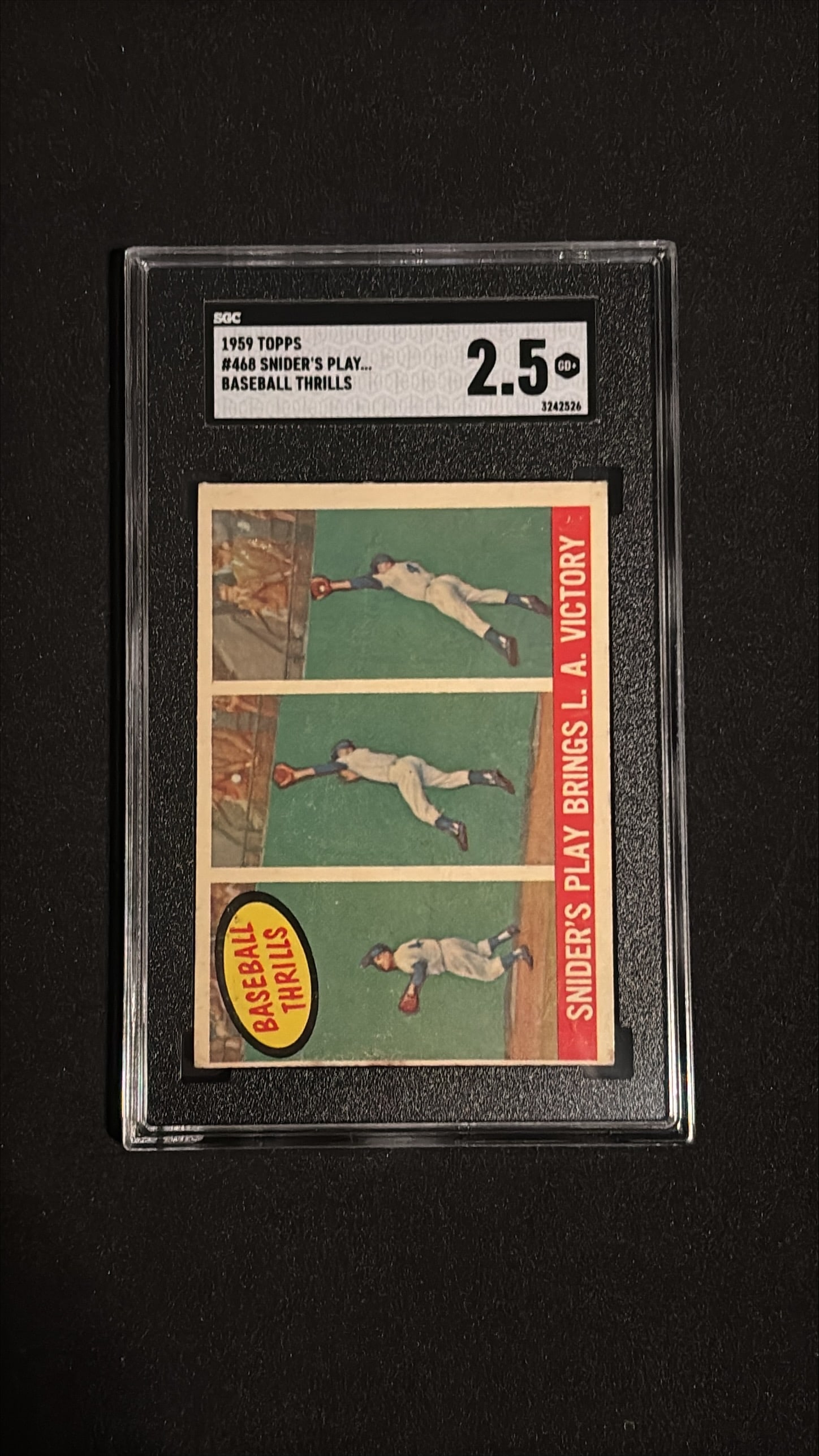 1959 Topps #468 Baseball Thrills SGC 2.5 GOOD+: 1959 Topps #468 "Snider's Play Brings L.A. Victory" from the Baseball Thrills subset. Graded SGC 2.5 (Good+). A vintage action photo card depicting Hall of Famer Duke Snider's memorable defensive play