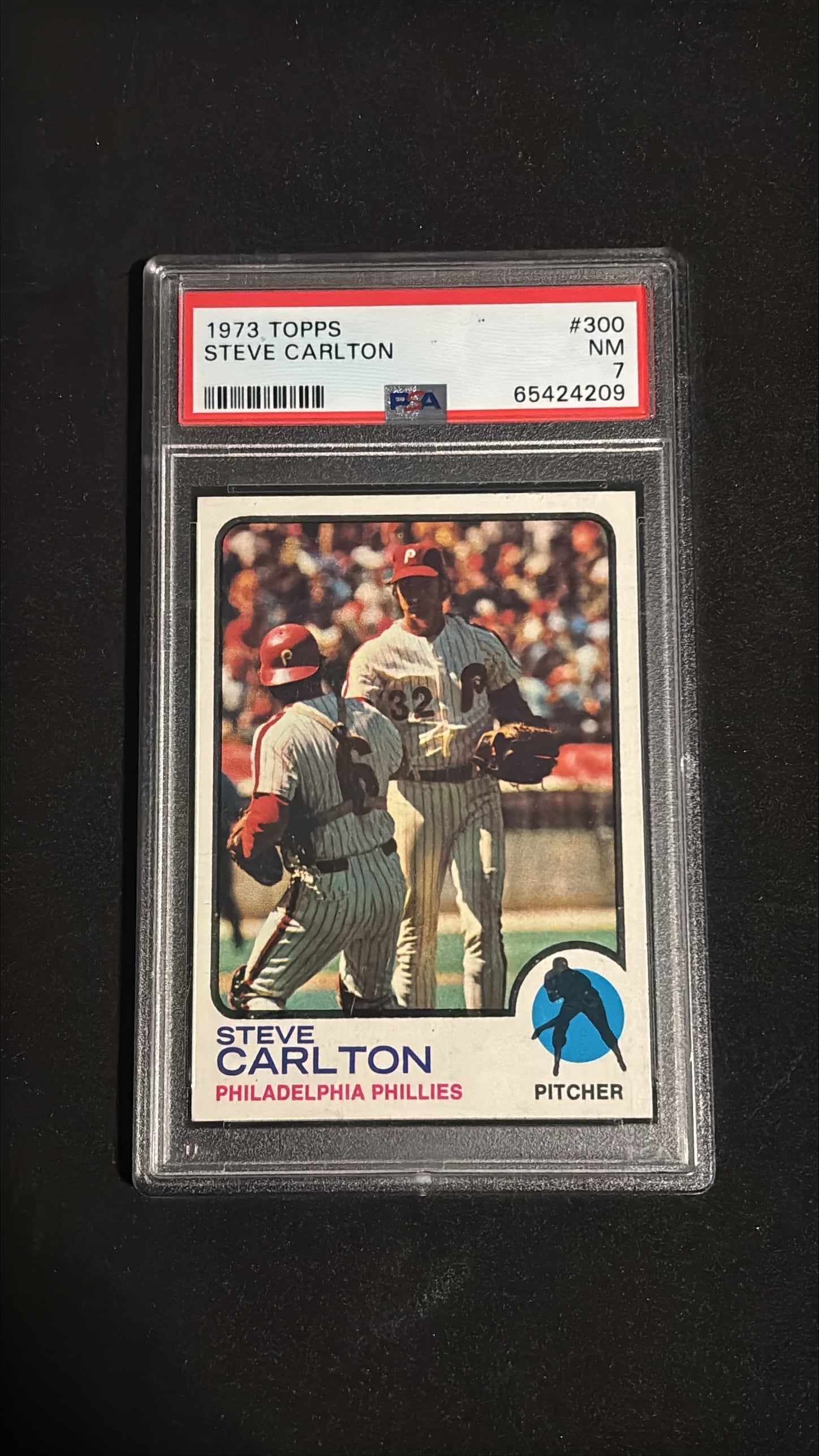 1973 Topps #300 Steve Carlton PSA 7: 1973 Topps #300 Steve Carlton graded PSA 7 (NM - Near Mint). Philadelphia Phillies pitcher. Steve Carlton is one of the greatest pitchers in baseball history - a Hall of Fame legend with 4-time Cy You