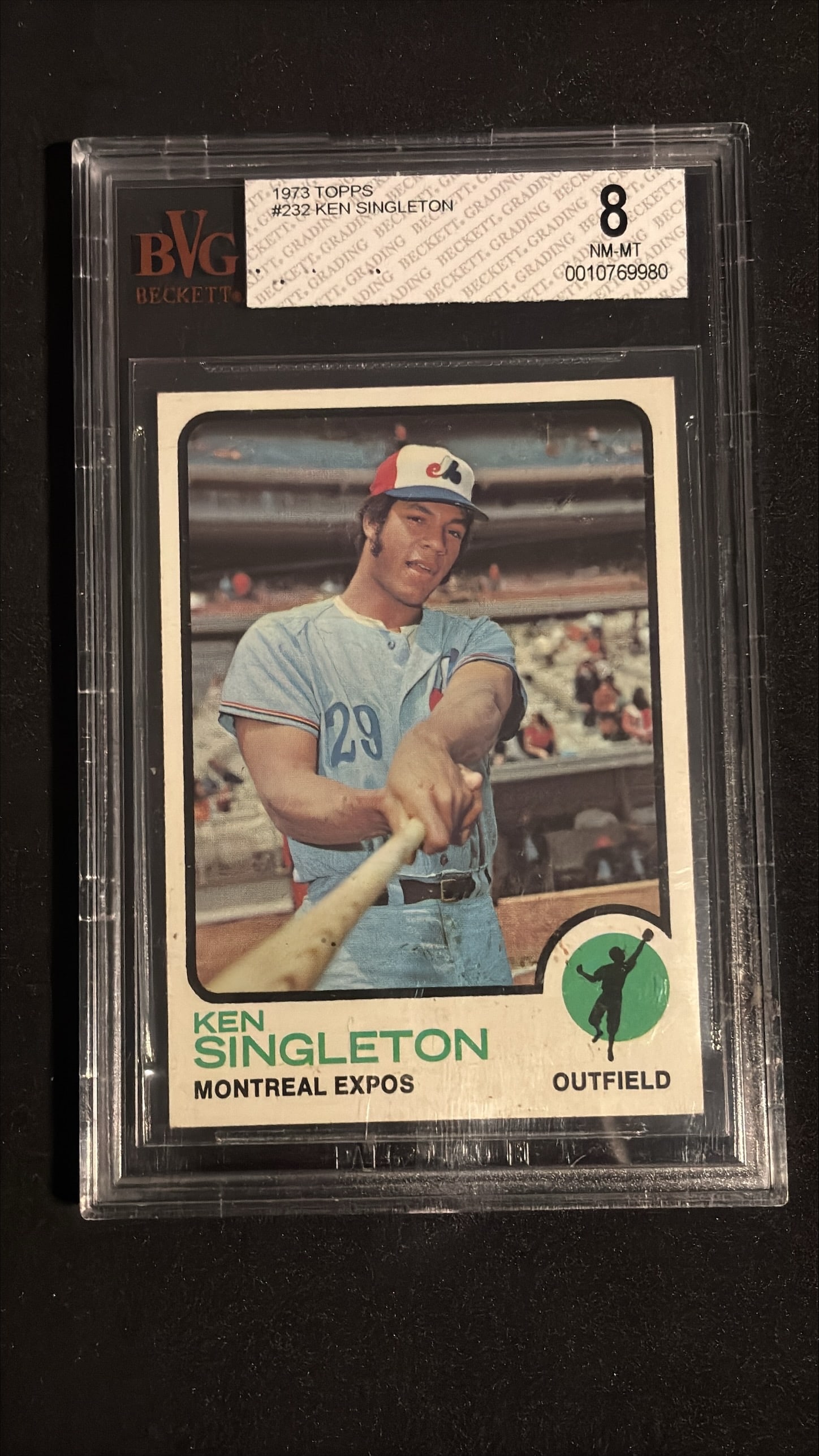 1973 Topps #232 Ken Singleton BVG 8: 1973 Topps #232 Ken Singleton graded BVG 8 (NM-MT - Near Mint to Mint). Montreal Expos outfielder. Ken Singleton was a solid outfielder who came to the Expos from the Mets in 1972 and quickly establis