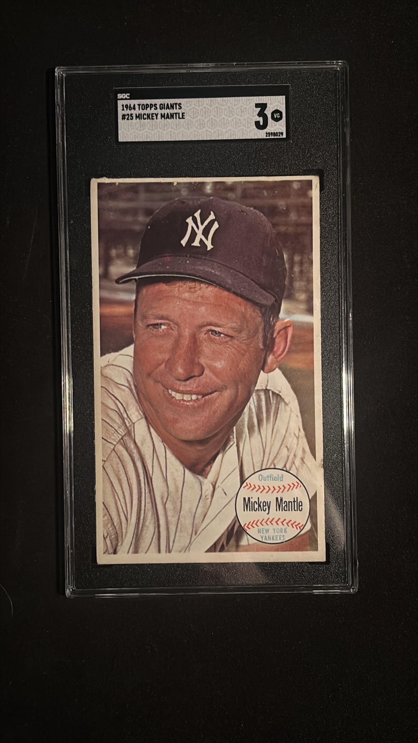 1964 Topps Giants #25 Mickey Mantle SGC 3 VG - New York Yankees Hall of Famer: 1964 Topps Giants #25 Mickey Mantle graded SGC 3 (VG - Very Good). This is the iconic Mickey Mantle card from the premium 1964 Topps Giants set, which features large postcard-sized (3-1/8" x 5-1/4") c