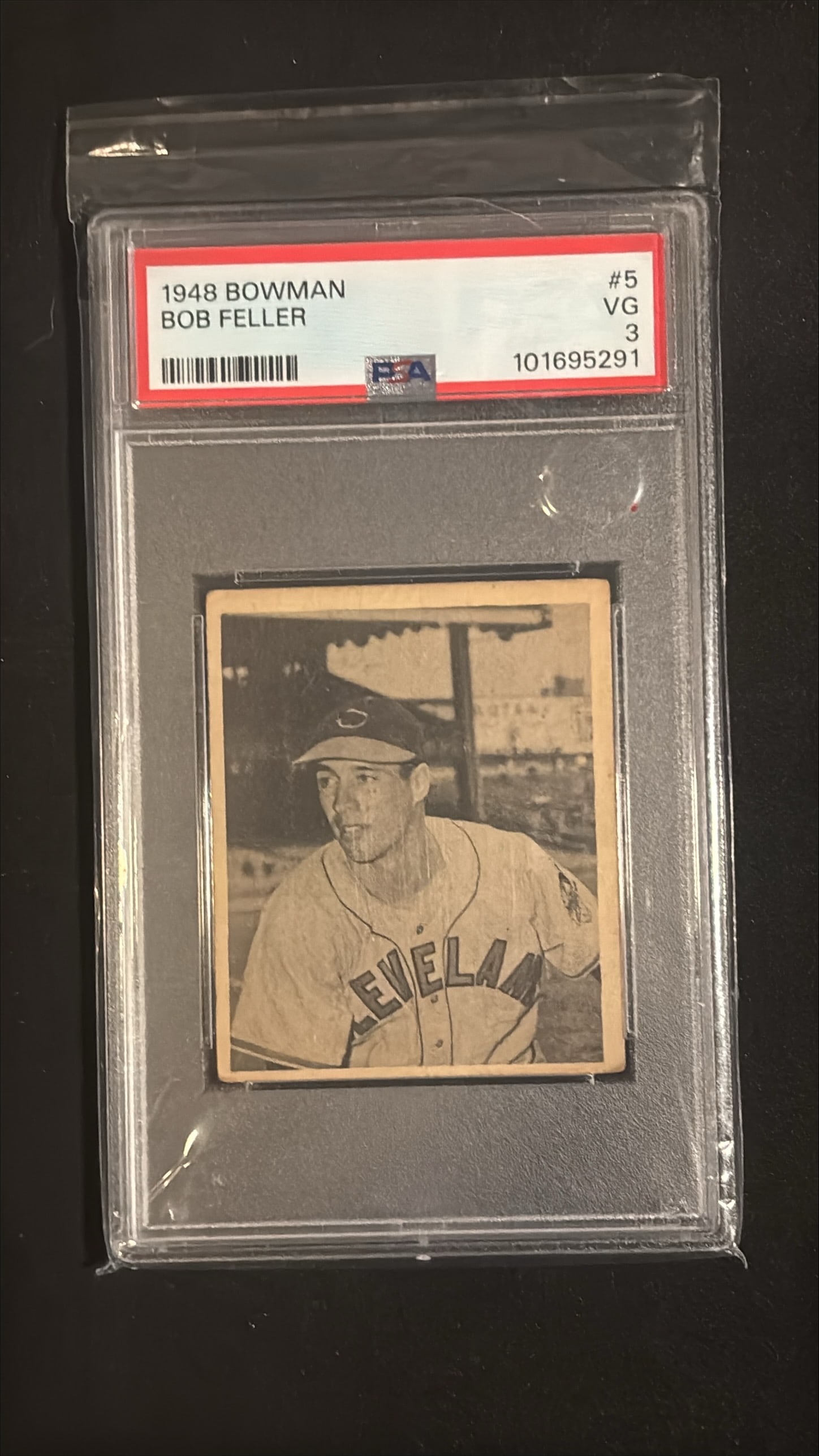 1948 Bowman #5 Bob Feller Rookie RC PSA 3 VG - Cleveland Indians Hall of Famer: 1948 Bowman #5 Bob Feller graded PSA 3 (VG - Very Good). This is a classic early Bowman rookie card of Hall of Famer Bob Feller, one of the greatest pitchers in baseball history. Feller was inducted i