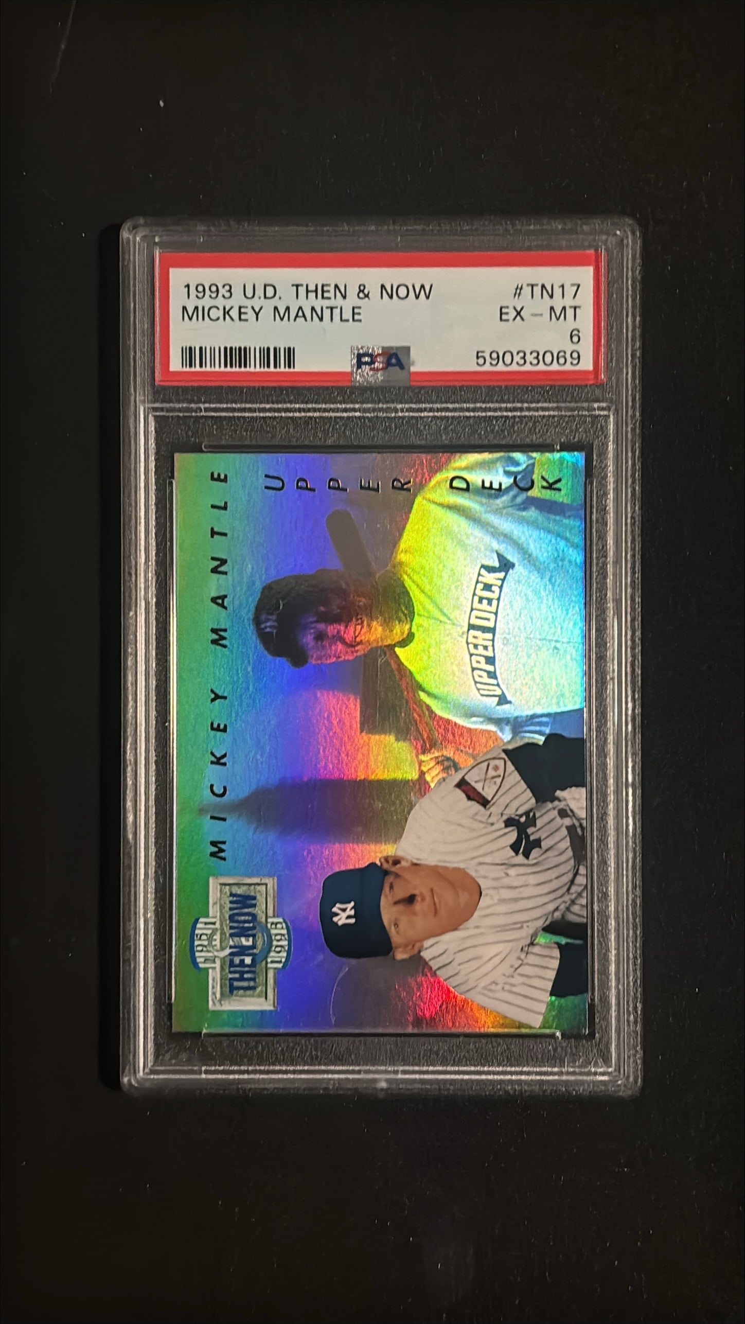 1993 Upper Deck Then & Now #TN17 Mickey Mantle PSA 6 EX-MT - Hologram Insert: 1993 Upper Deck Then & Now #TN17 Mickey Mantle graded PSA 6 EX-MT. Rare hologram insert card comparing Mantle's rookie year to modern photo. 18-card set with Hall of Famers. Inserted 1 per 27 packs in