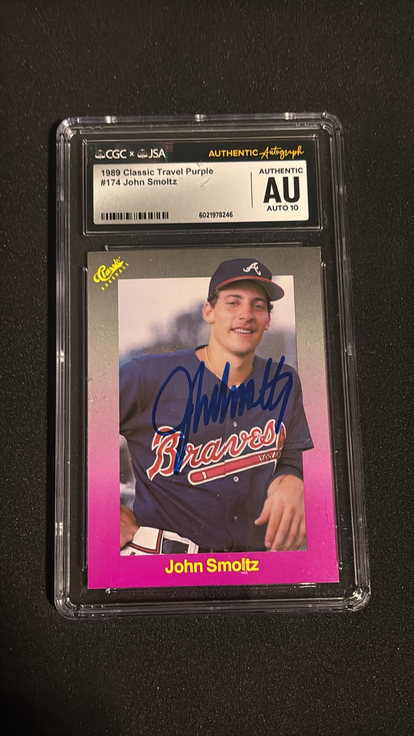 1989 Classic Travel Purple #174 John Smoltz Signed AUTO 10 - Braves Rookie: 1989 Classic Travel Purple #174 John Smoltz signed card with AUTO 10 (perfect autograph grade) authenticated by JSA. Hall of Famer pitcher, 8x All-Star, 1996 World Series MVP, only pitcher to be World