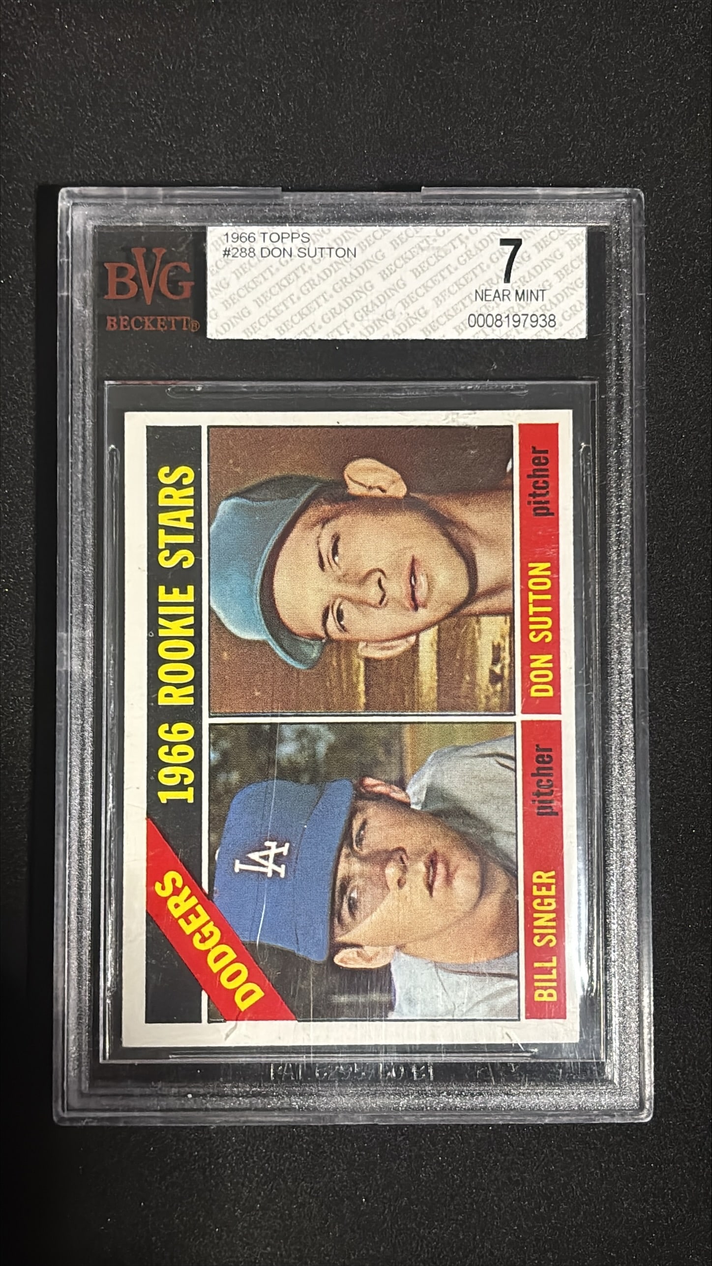 1966 Topps #288 Don Sutton Rookie Stars BVG 7 Near Mint - Dodgers: 1966 Topps #288 Don Sutton rookie stars card graded BVG 7 Near Mint (shared with Bill Singer). Hall of Famer pitcher, 324 career wins, 5x All-Star, key 1966 Topps card.