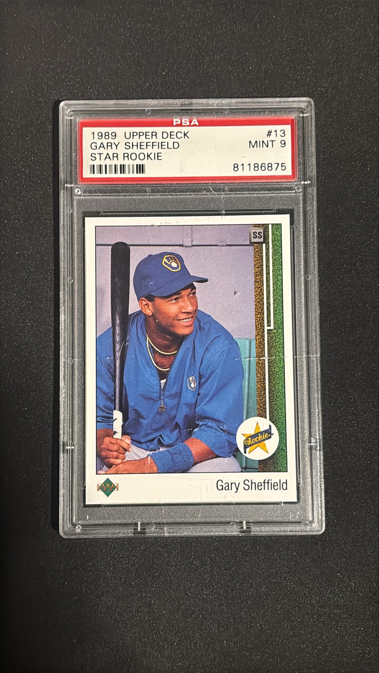 1989 Upper Deck #13 Gary Sheffield Star Rookie PSA 9 Mint - Brewers: 1989 Upper Deck #13 Gary Sheffield star rookie card graded PSA 9 Mint. Hall of Famer, 509 career HRs, 8x All-Star, versatile defensive player, Milwaukee Brewers.